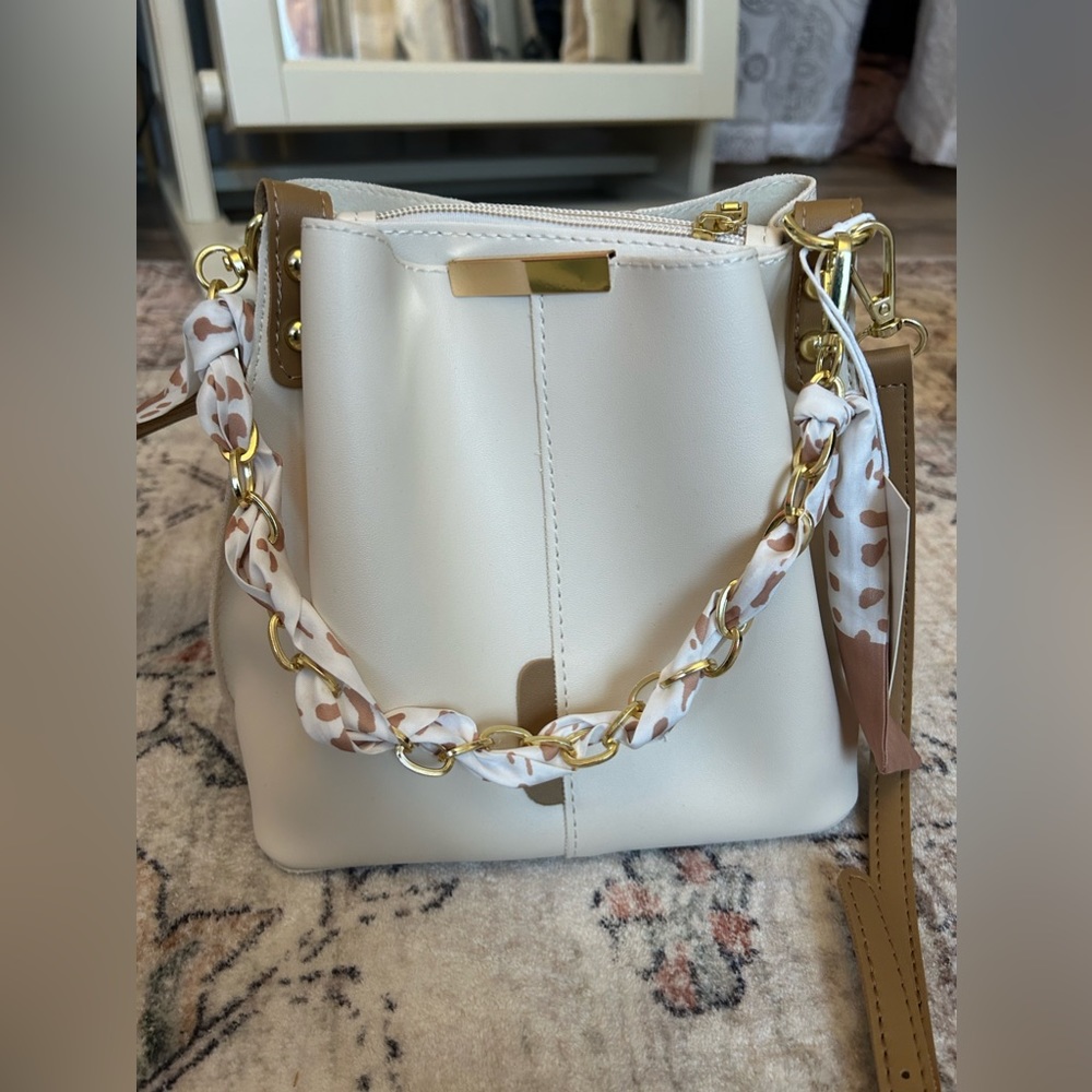 NWT Cream canvas cross body bucket bag. Never used
